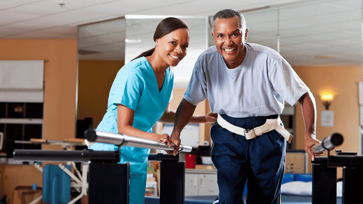 Healthcare workers exercising together on treadmills in a modern gym facility